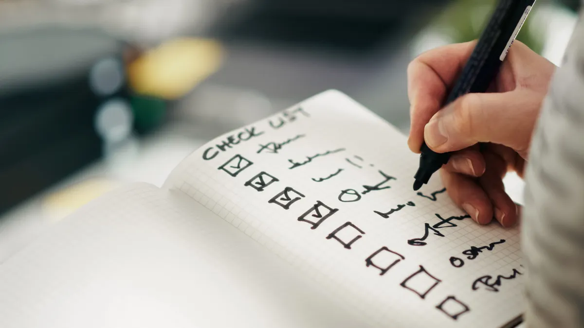Security and compliance checklist for choosing a premium AI writing tool Security and compliance checklist for choosing a premium AI writing tool — Close-up of a Hand Writing on a To-Do List